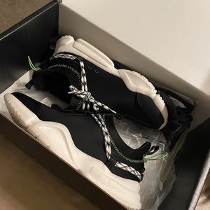 John Geiger Men’s size 9 or Women’s 10.5 -black /white